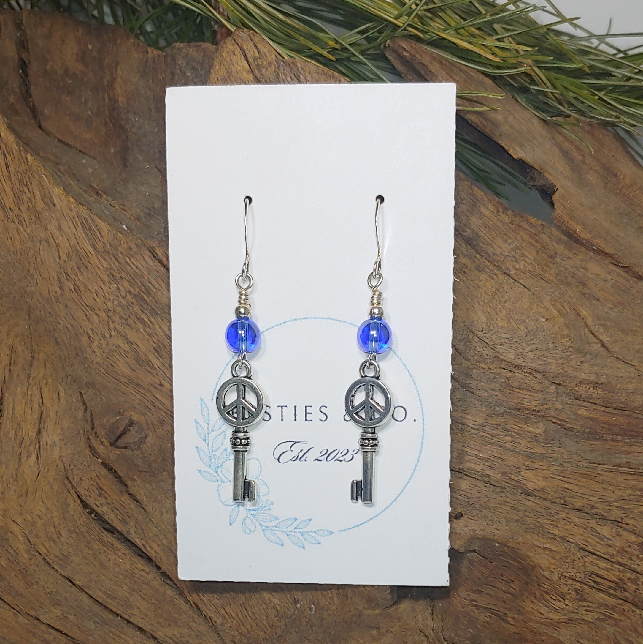 Key w/ Blue Earrings